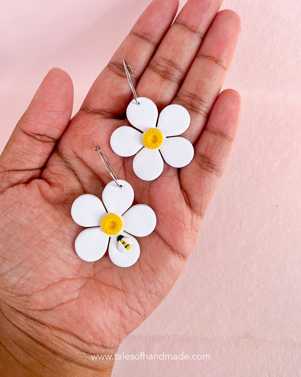 Thumbnail: Handmade White Daisy Earrings featuring a tiny bee, floral polymer clay jewelry, delicate and nature-inspired, perfect gift