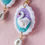 Thumbnail: Dreamy swan earrings with detailed hand-sculpted wings, in a blue, purple background, perfect for romantic jewelry lovers