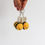 Thumbnail: Handmade bumble bee crochet keychain in yellow and black, with keyring attached, made from soft premium cotton yarn