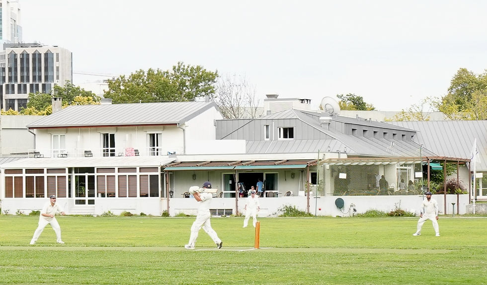 Dougie Henderson on the attack with the Clubhouse in the background