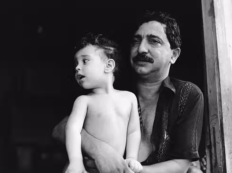 Chico Mendes e o filho Sandino em 1988