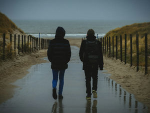Two people walking, having the same argument again and again