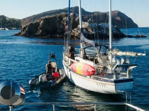 A group of wildlife officers preparing to board a commercial fisherman’s vessel to inspect their catch, & ensure proper compliance. Credit to California Department of Fish & Wildlife.
