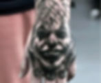 joker hand tattoo