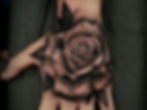 rose hand tattoo