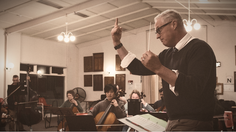 Paul conducting rehearsals_edited.png