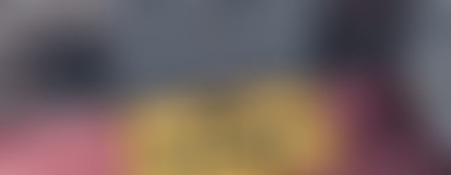 CarolaSims' Evil Eye Doormat with a decorative eye, text "Good Vibes Only" in black, on a red floor. Background features a gray door.