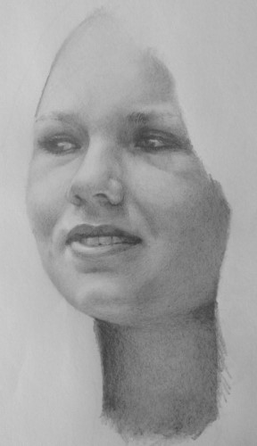A half finished pencil sketch of a woman's face with a serene expression. The background is blank, focusing on the detailed shading and contours of her features. The drawing is part of a lesson on How to draw a portrait from the online drawing course "Pencil Drawing Made Easy" by Nolan Clark.