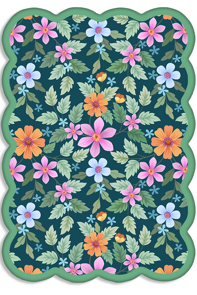 CarolaSims' mint rug in a colorful floral pattern with pink, orange, and blue flowers on a dark green background. A minty green scalloped border frames the design. The rug is from the Happy Rugs collection.