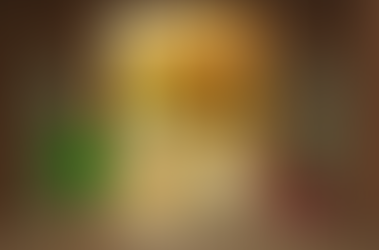 A large Sunflower painting from the "Bouquets" paintings set by CarolaSims featuring a vase of sunflowers. Around the room, a green plant in a patterned pot and a red armchair from the furniture set "Comfy Cloud Living Set" by CarolaSims.