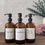 Thumbnail: Amber Glass Bathroom Bottles with Pump | Signature Collection