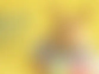 A fluffy rabbit sits in a basket with colorful eggs. Text reads "Before you buy that Easter bunny: What every family should know." Bright yellow background.