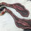 Thumbnail: MADE TO ORDER - Mahogany & Black Tooled Feather Curved Body Spur Straps