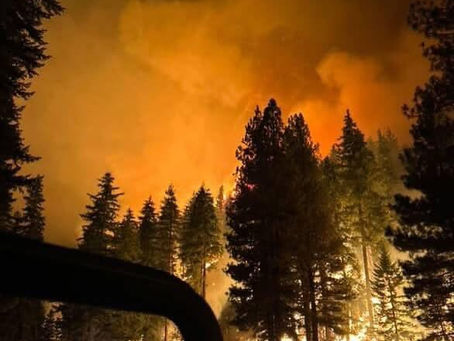 Wind whipped wild land fires prompt new evacuation orders