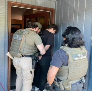 U.S. Marshals' arrest of Mark Okhrimchik at a home in University Place, Sept. 17. Photo courtesy: Douglas County Sheriff's Office.