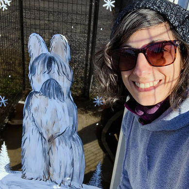 seasonal holiday window art for dog grooming salon