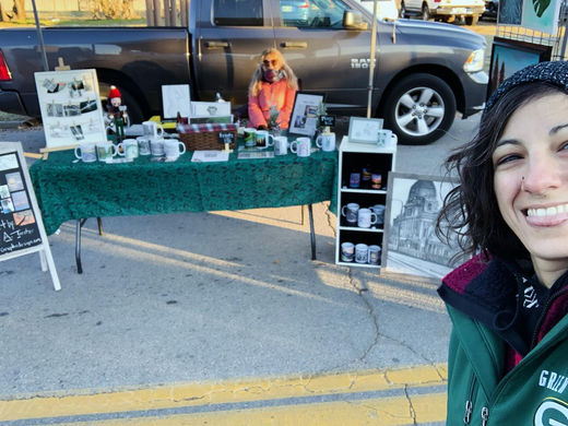 artwork by local artist Maria A Trester on display at the Tulsa Farmers Market Yuletide Market