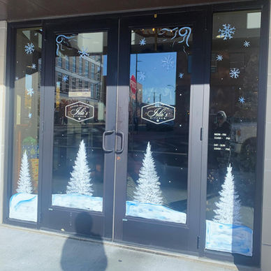 Holiday winter window art