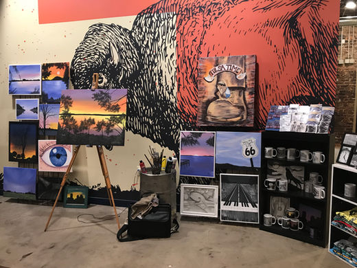 Booth display and blank canvas before the live painting by Maria A Trester at the Marshall's Brewery Artist Spotlight. 