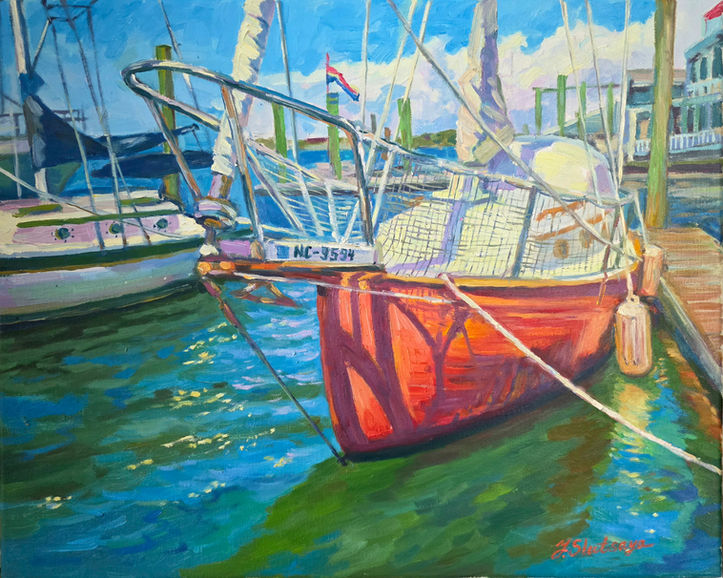 An impressionist oil painting of a sailboat with a vibrant red hull docked at the Beaufort Marina in North Carolina under a bright blue summer sky, titled Carolina Summer Joy by artist Yana Slutskaya.