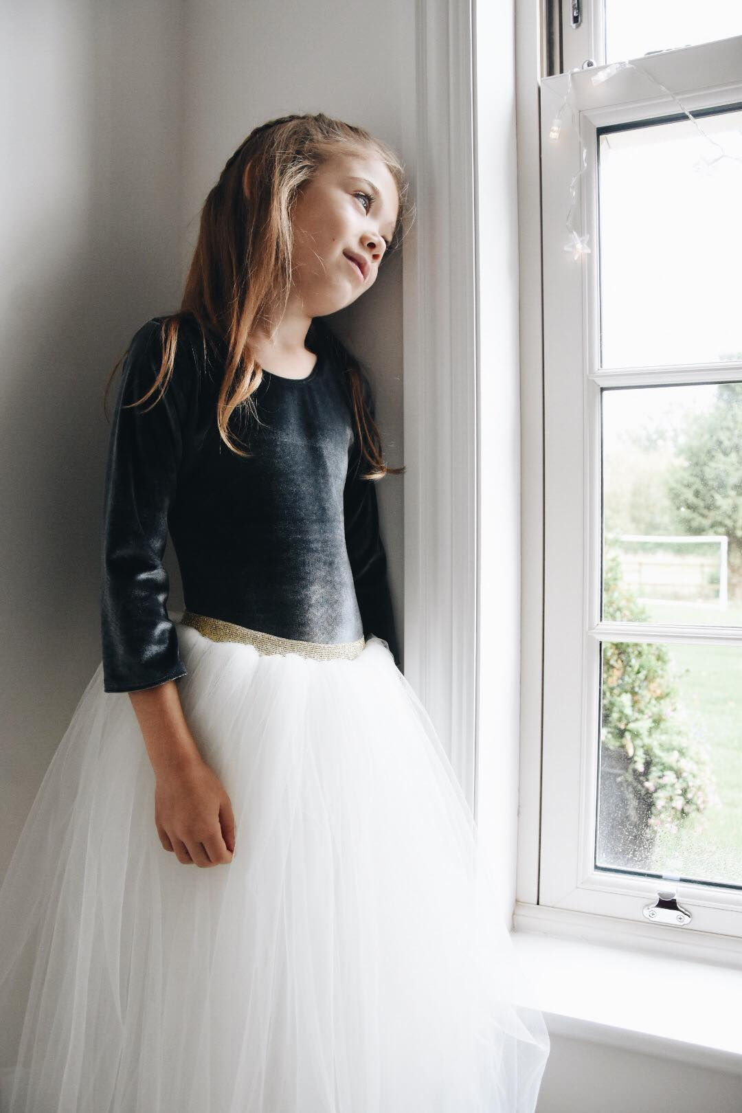 A handmade long sleeve velvet leotard and a long ivory white soft tulle tutu skirt.  
The perfect handmade flower girl dress. Girls Christmas dress winter baby girl flower girl dress Girls birthday tutu dress