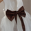 Thumbnail: Sparkly tulle heart back chocolate brown large bow sash flower girl dress