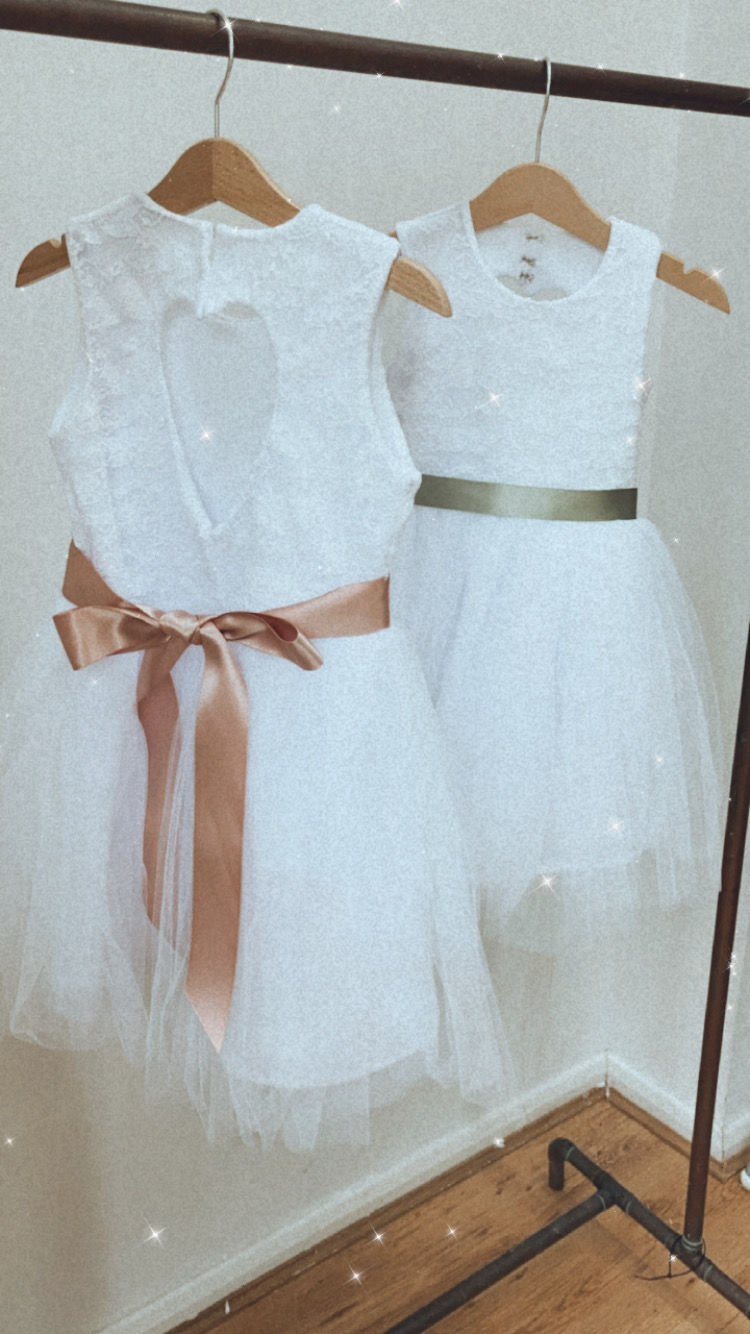 Thumbnail: A handmade ivory white lace  tutu dress with a heart cut out back. It features a soft ivory white tulle skirt that falls knee length and a sage or blush ribbon bow sash. The perfect flower girl, birthday dress or Christmas party dress