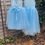 Thumbnail: A handmade powder blue tutu dress with a soft tulle skirt that falls to the ankle. the back features a heart cut out back, perfect flower girl or birthday dress