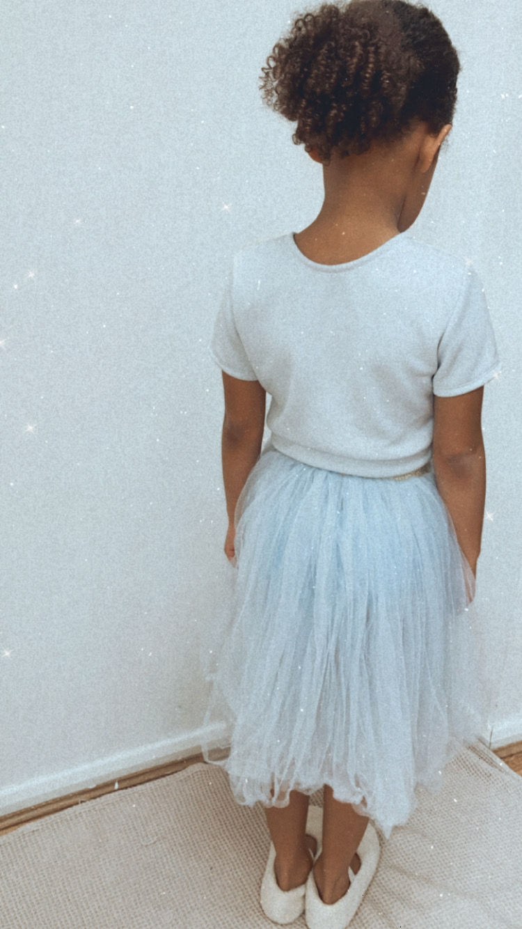 A handmade grey tutu skirt and fitted cap sleeve top. It features a soft light grey tulle skirt that falls just below the knee. The perfect flower girl, birthday dress or Christmas party dress