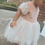 Thumbnail: A handmade blush velvet tutu dress soft tulle puff sleeves and a blush tulle skirt that falls to the knee. Perfect flower girl or birthday dress