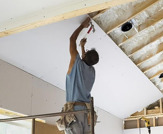 homeguide-contractor-hanging-and-installing-drywall-t_edited.jpg