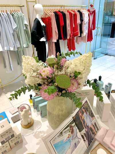 Corporate subscription flower delivery for Homebodii retail store at Westfield Chermside by best corporate florist Iris and Elle