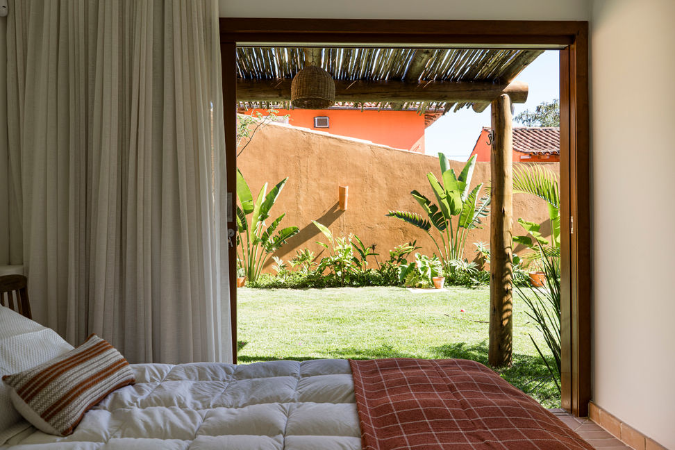 Quarto com vista para o jardim