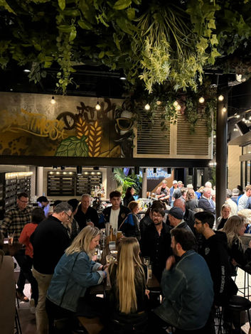 Corporate function at John Barleycorn’s Taphouse rooftop, Auckland business event space with drinks and shared plates.