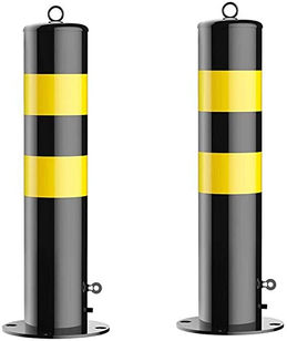 A pair of tall, cylindrical bollards or posts with alternating black and yellow striped patterns. These types of bollards are commonly used in parking lots, driveways, and other areas to mark boundaries, prevent vehicle access, and protect structures from potential collisions or impacts.
