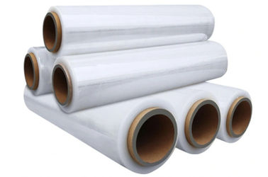 This image shows several rolls of white stretch film or plastic wrap, which are commonly used for packing, bundling, and securing items during storage or transportation. The rolls appear to be made of a transparent, flexible material and have cardboard cores at the center. These types of plastic wraps are versatile and widely used in various industries, from warehousing and logistics to retail and shipping.