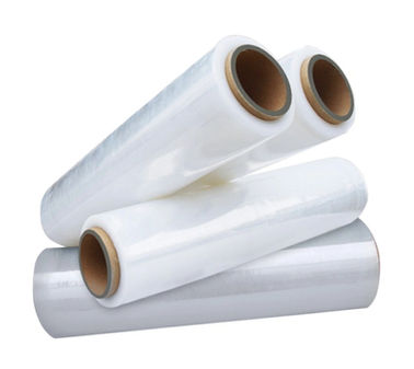 This image shows several rolls of white stretch film or plastic wrap, which are commonly used for packing, bundling, and securing items during storage or transportation. The rolls appear to be made of a transparent, flexible material and have cardboard cores at the center. These types of plastic wraps are versatile and widely used in various industries, from warehousing and logistics to retail and shipping.