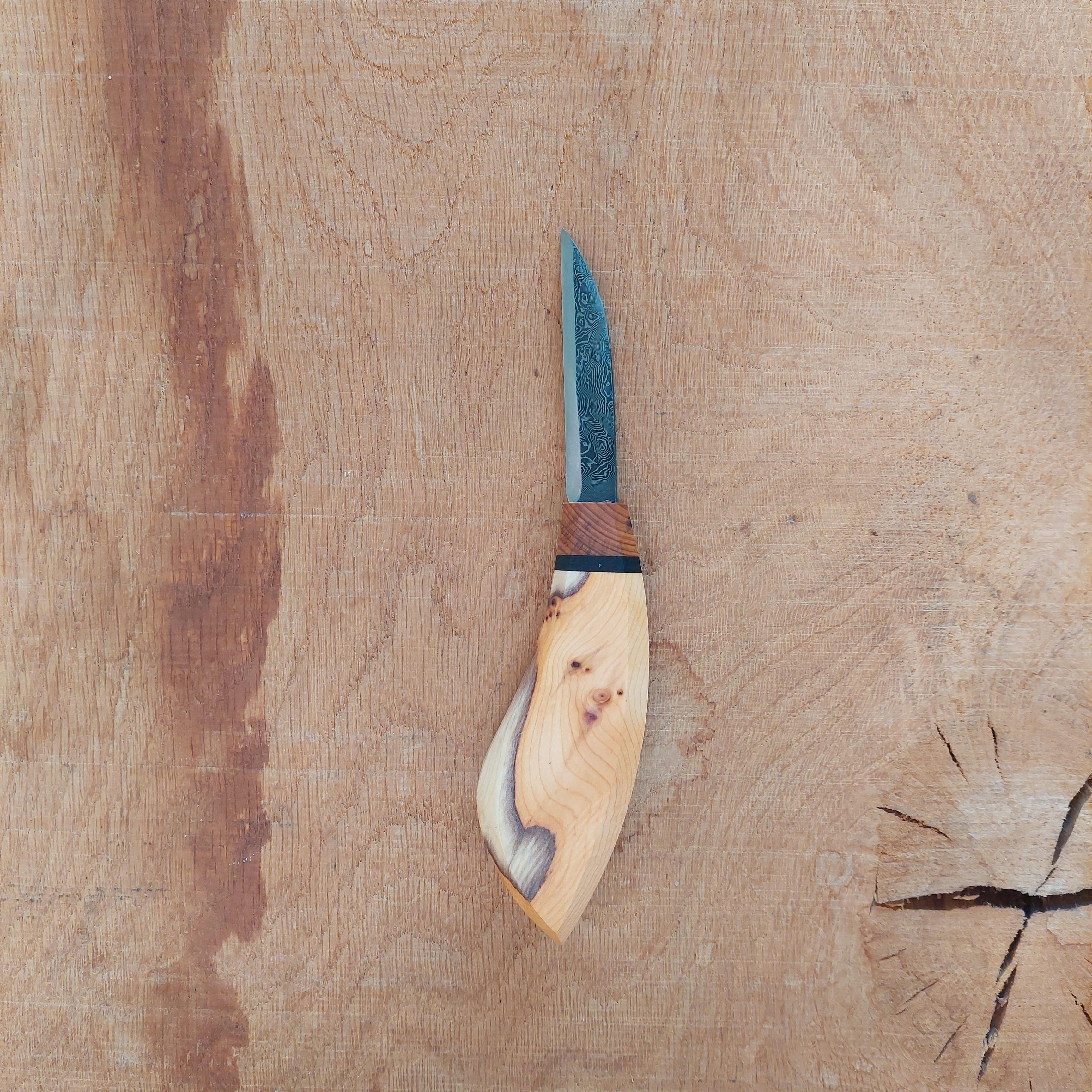 Yew Damascus carver