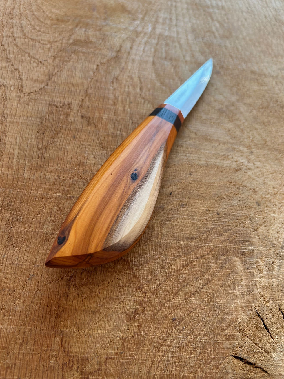 Thumbnail: Yew Mora carver