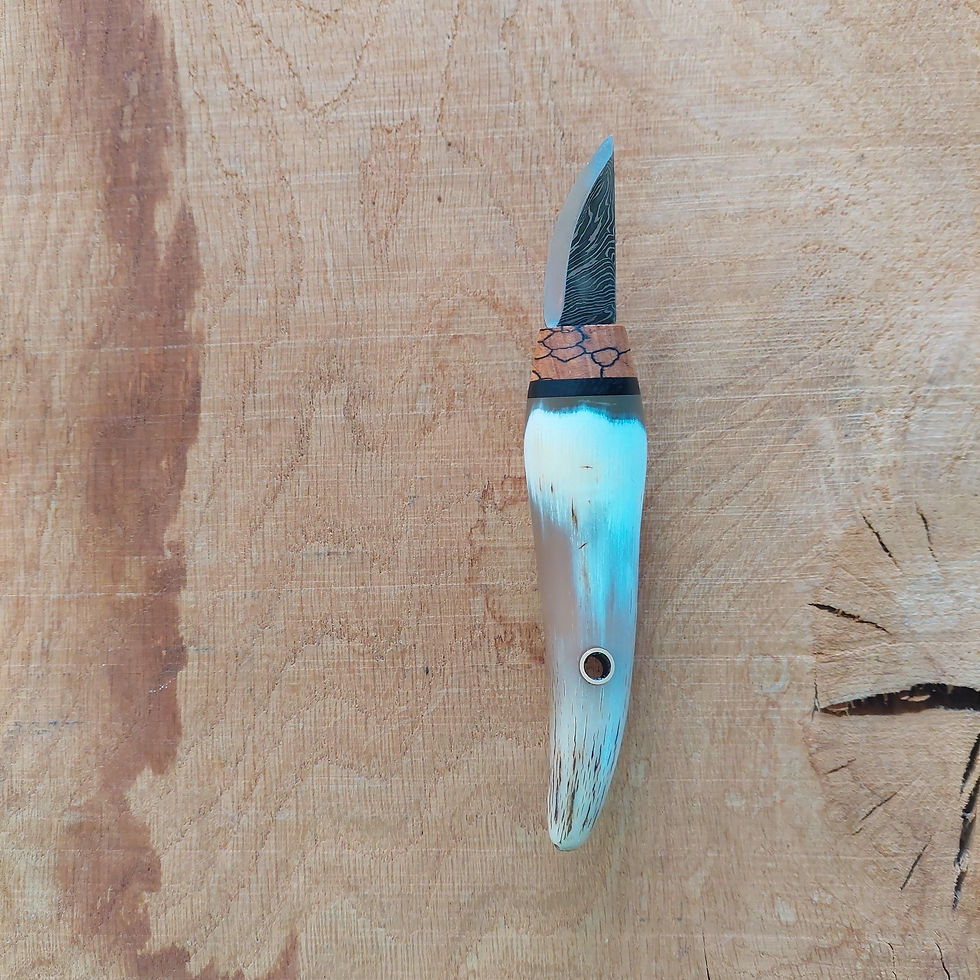 Thumbnail: Ox horn carver