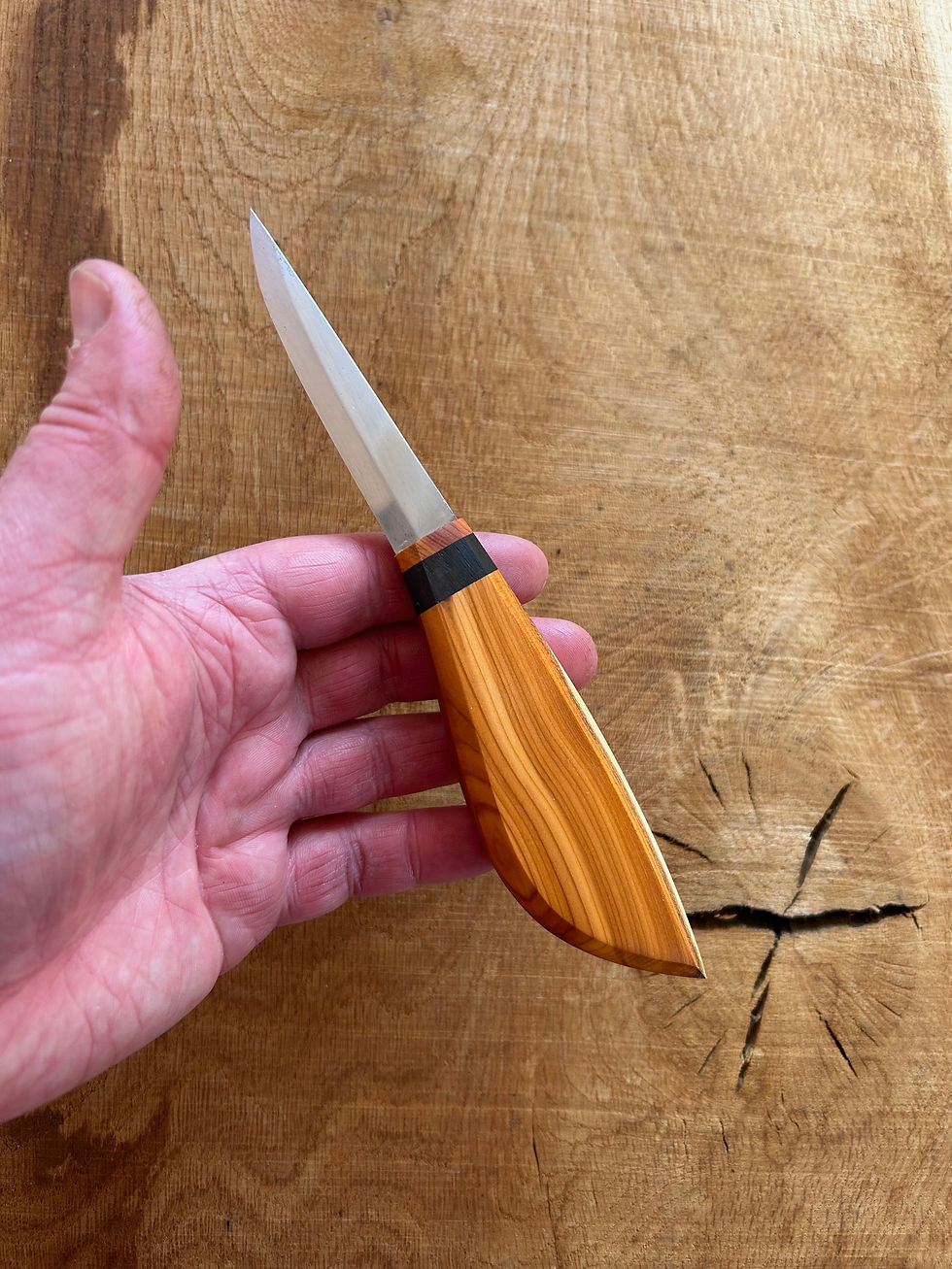 Thumbnail: Yew & Mora carver