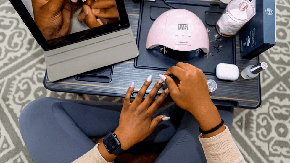 Experience Nails Academy Nail Technician Practicing While Learning Online.gif