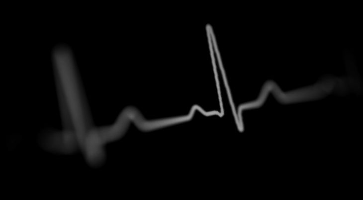 a green heart beat on a black background_edited.jpg
