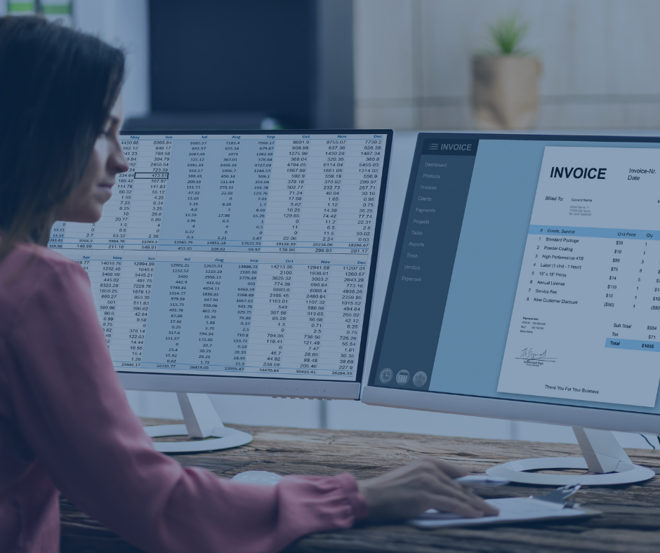 Person looking at two computer screens with accounting software