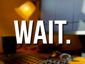Keyboard and the word WAIT