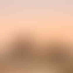 Waves crashing against rocks at the ocean edge in Goa, India