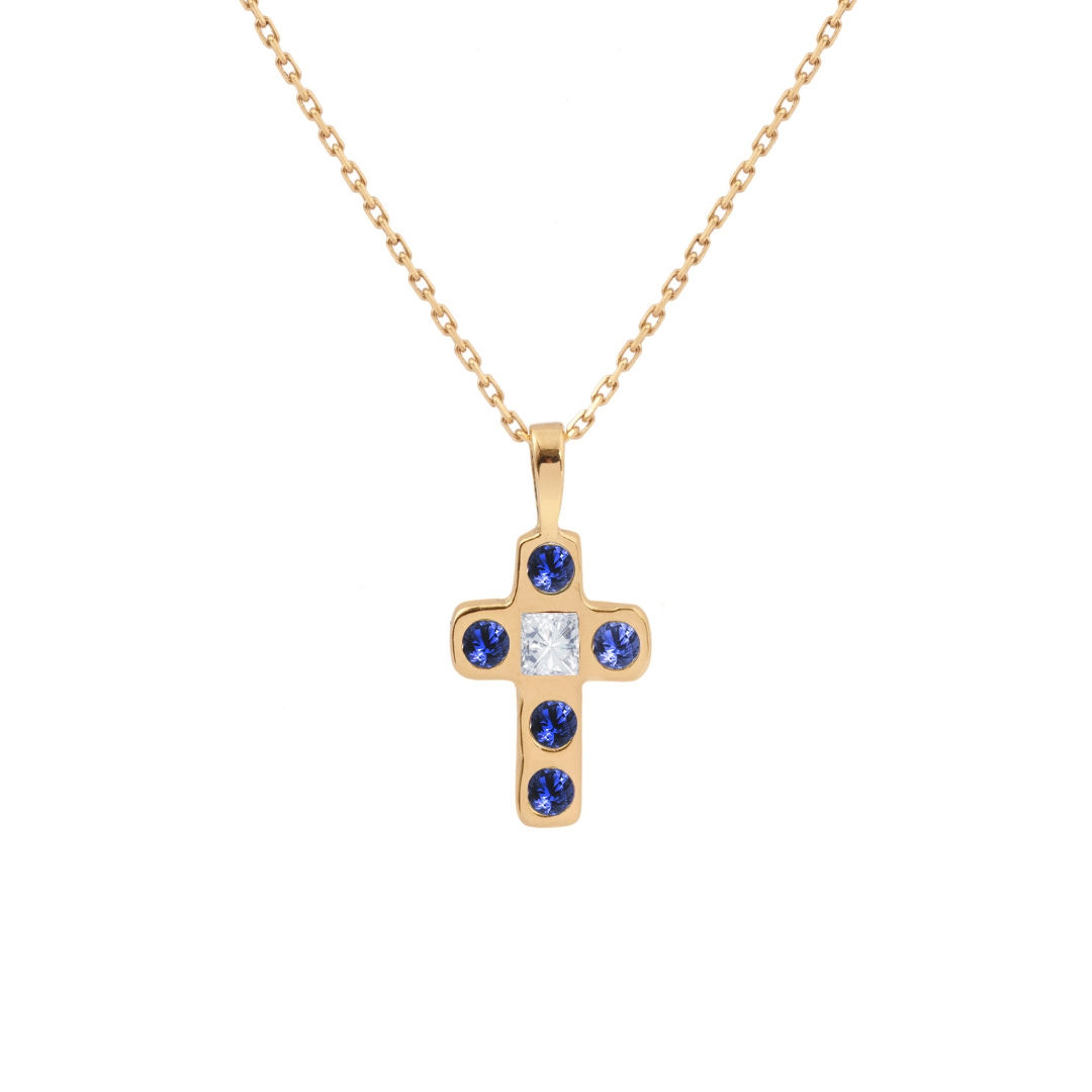Collier croix en or 18 carats, diamant et saphirs bleus. Joaillerie fine Les Merveilleuses.