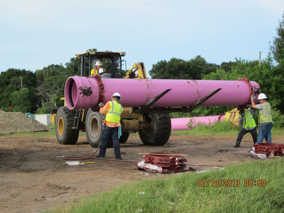 The team at Westra Construction Corporation works to move pipe for underground utility contractor pr