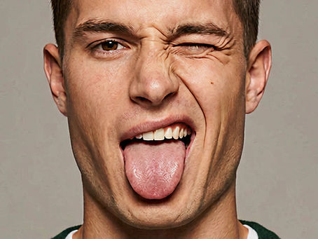 A visual example of a tongue examination used in Traditional Chinese Medicine (TCM) to assess internal organ health, fluids, and metabolic balance.