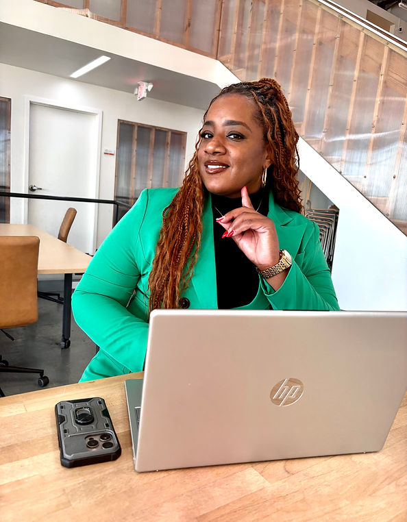 green.laptop.sittingdown.ceo.jpg